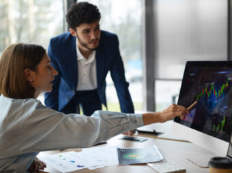 people-office-analyzing-checking-finance-graphs